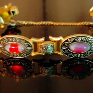 Beautiful Damascene gold bracelet with pink and red and white stones